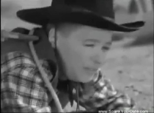 spanking scene from the western film the stagecoach kid